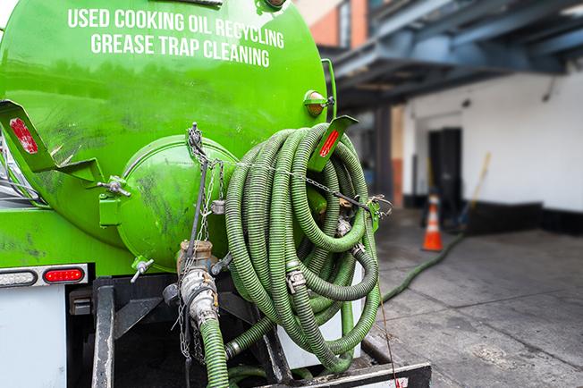 workers at Grease Trap Cleaning of Urbana