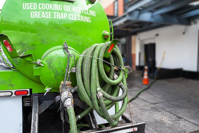 routine pumping of grease trap at a cafeteria in Bull Valley IL